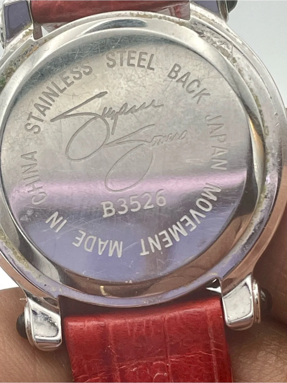 Suzanne Somers Watch with Floating 4 Rhinestone Butterflies. Red Leather Band